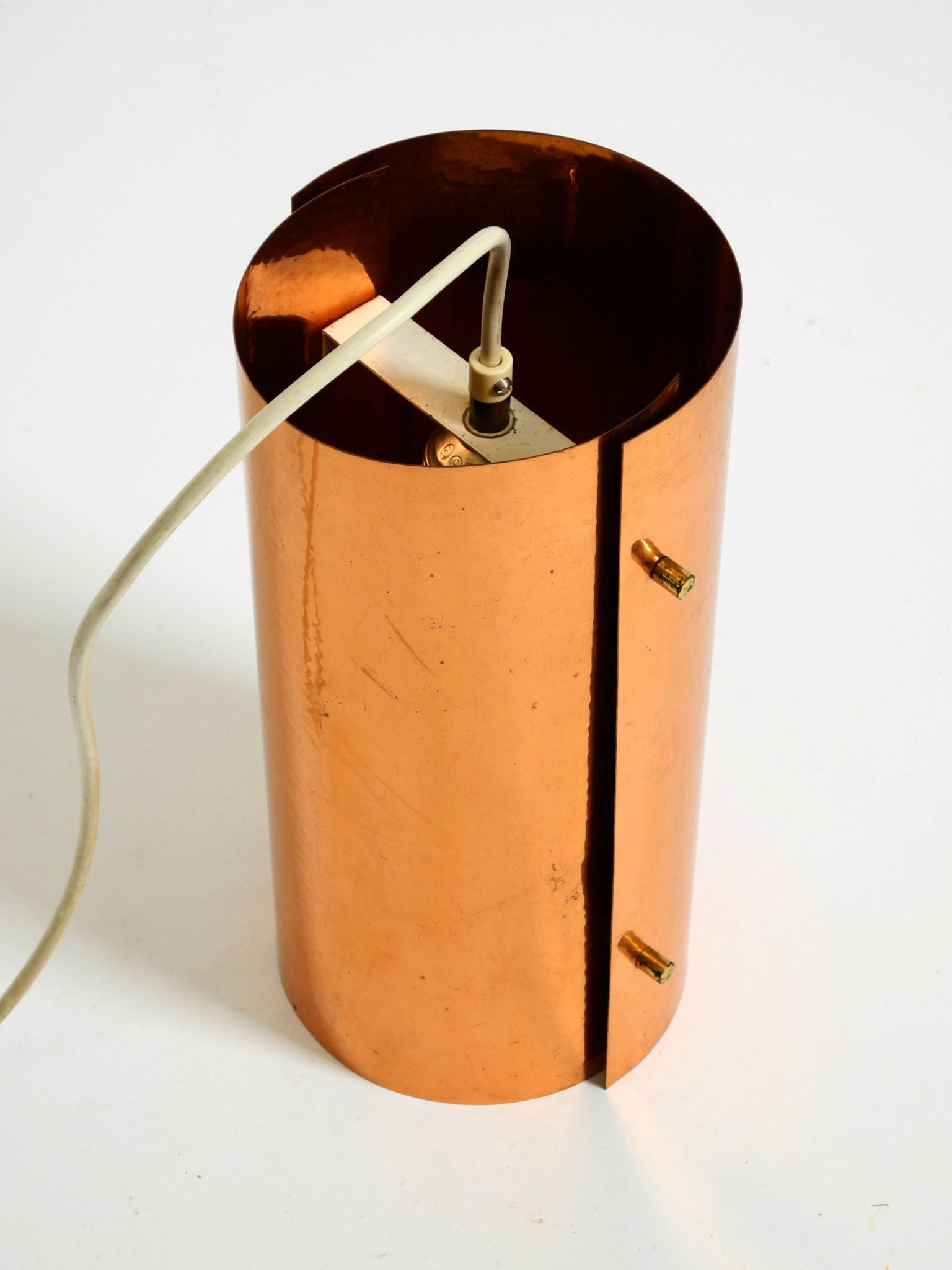 Two 50s tube pendant lamps consisting of two screwed-together copper bowls