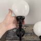 Pair of vintage enameled cast iron wall sconces