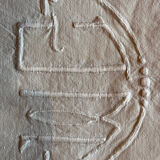 Old embroidered monogram sheet