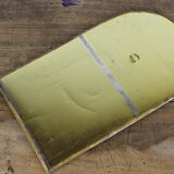 Decorated brass mirror.