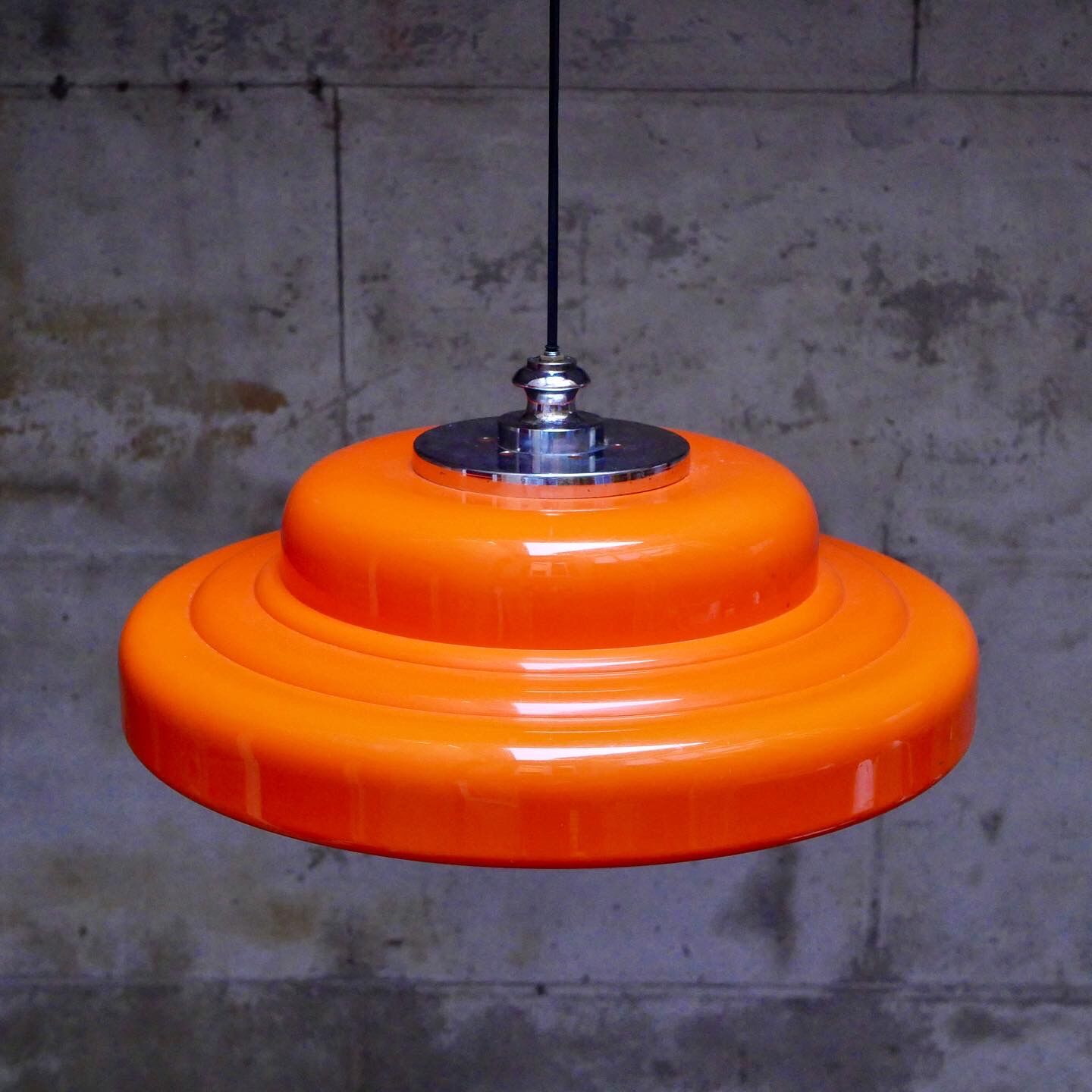 Orange space age suspension
