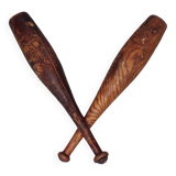 2 old wooden juggling clubs