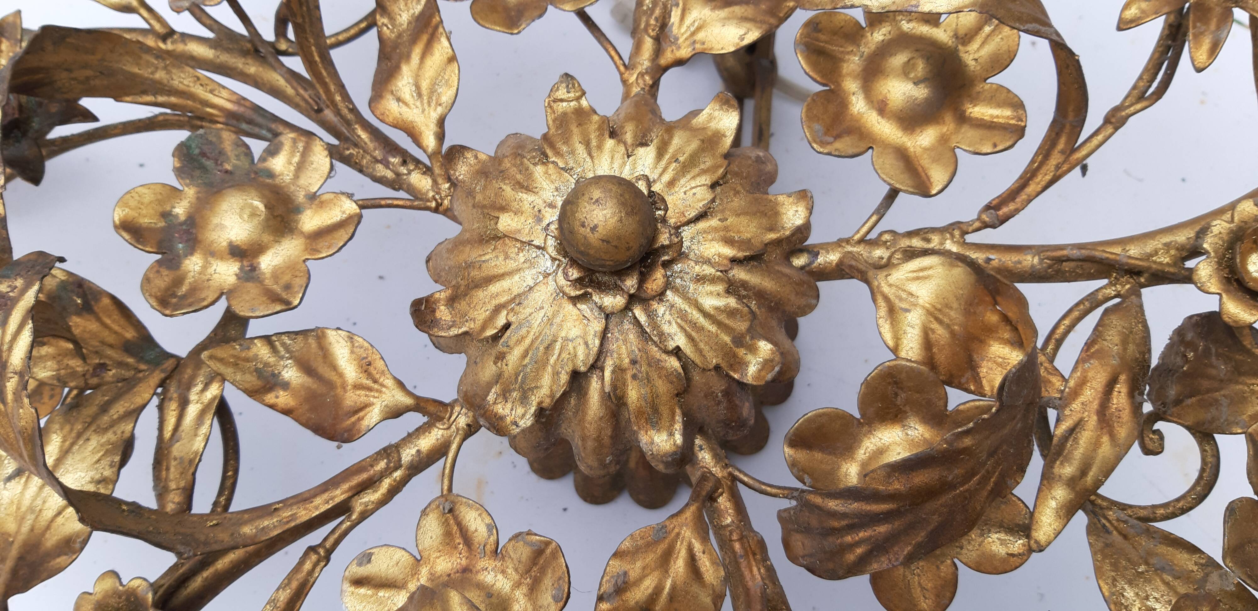 Vintage chandelier in gilded metal