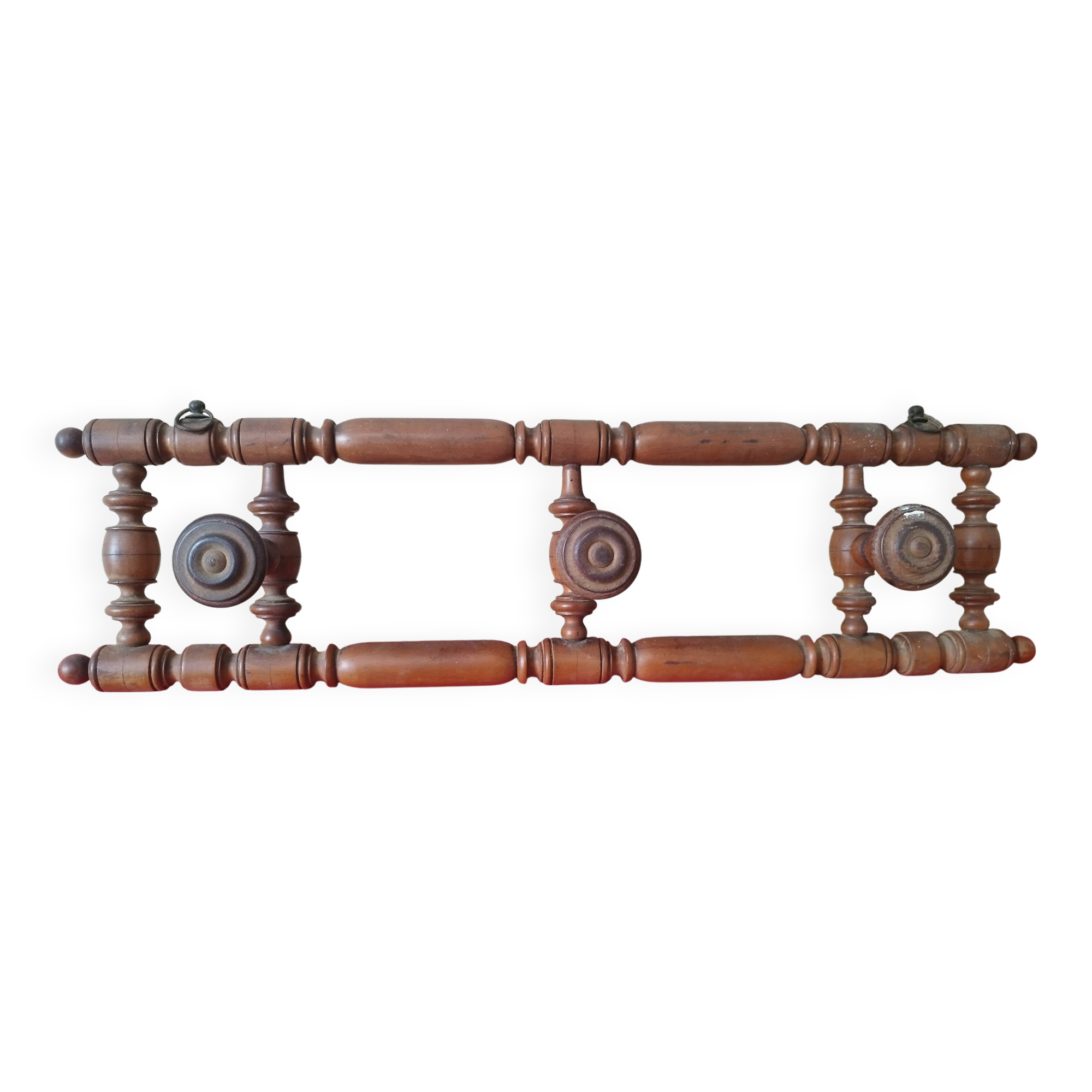 Old wooden wall coat rack