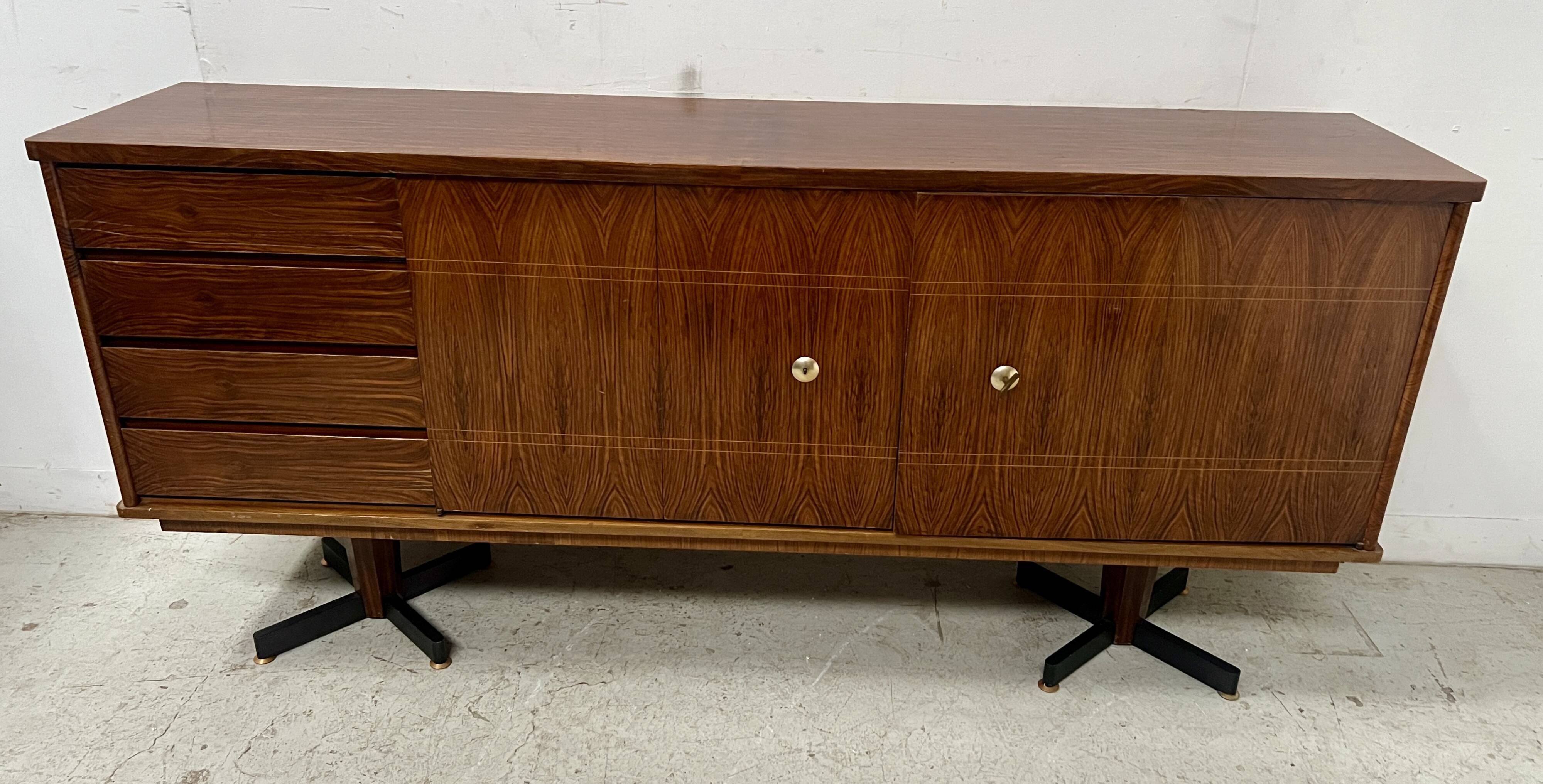 Scandinavian enfilade in veneered wood with iron legs, 20th century.