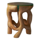Tabouret sculpté unique à partir d'une seule pièce de bois