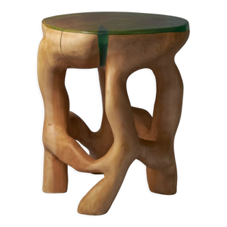 Tabouret sculpté unique à partir d'une seule pièce de bois