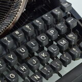 Olympia typewriter with suitcase