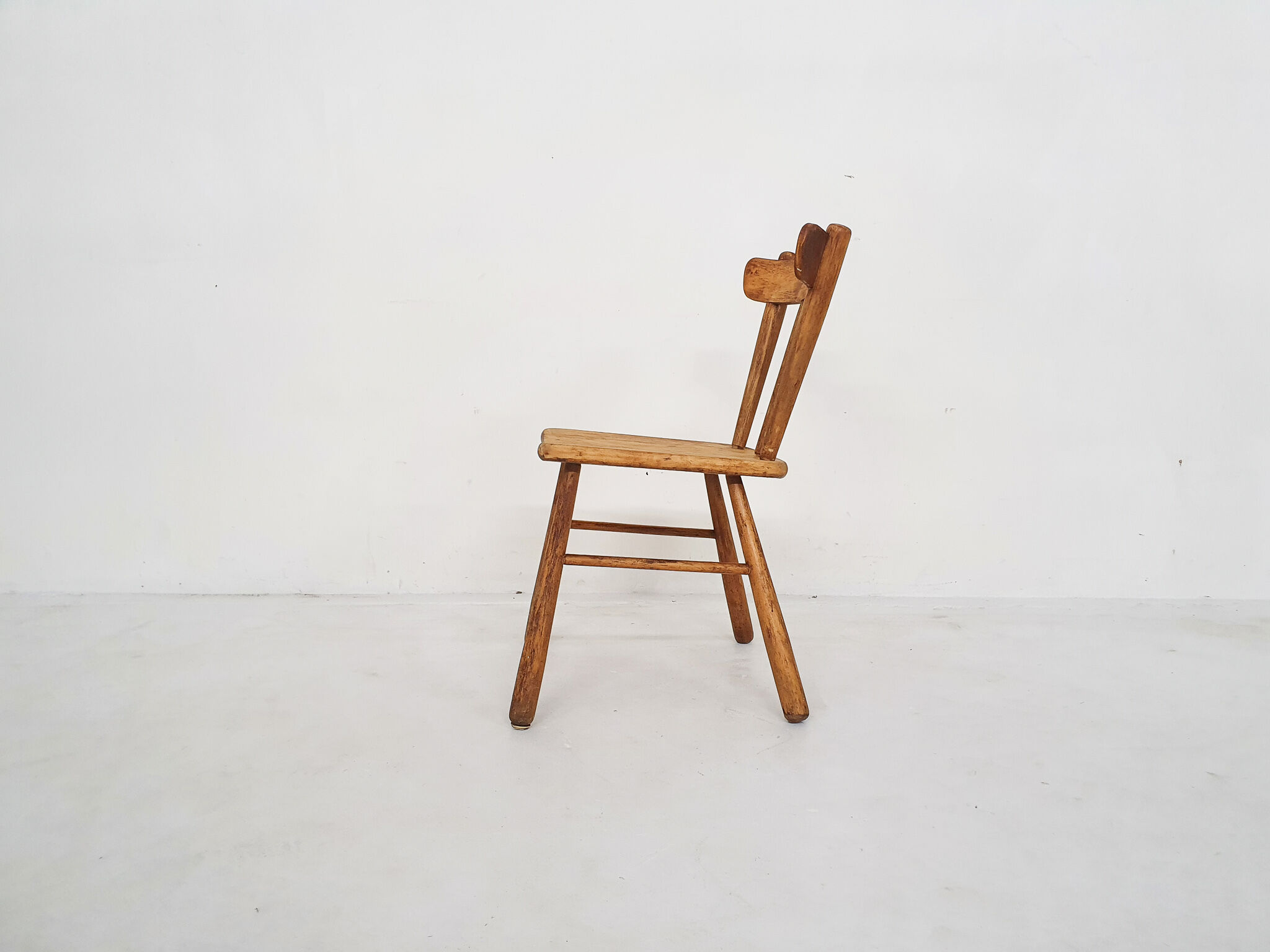 Scandinavian birchwood spindle back chair in the style of Ingvar Hildingson, Sweden 1950's