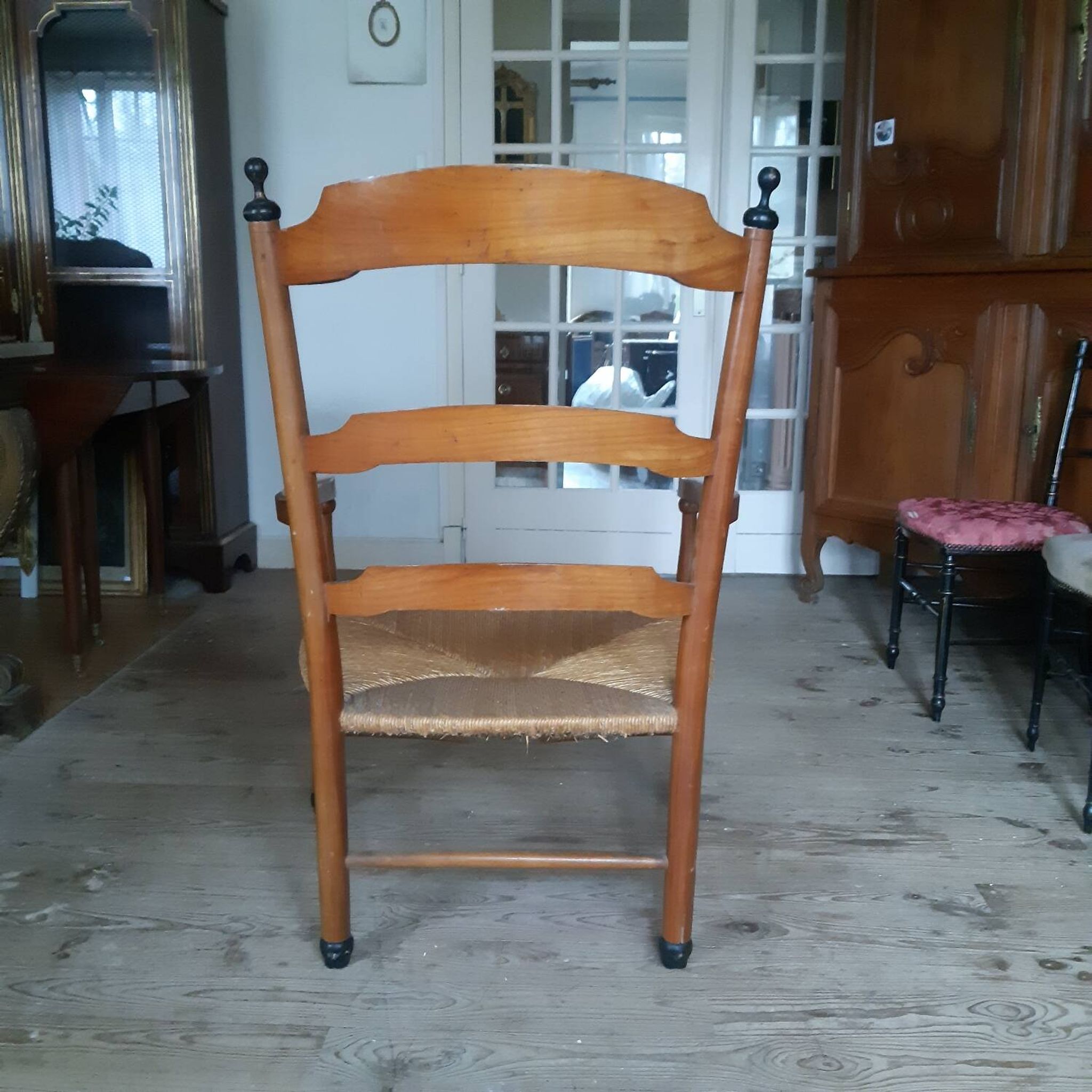 Large straw armchair