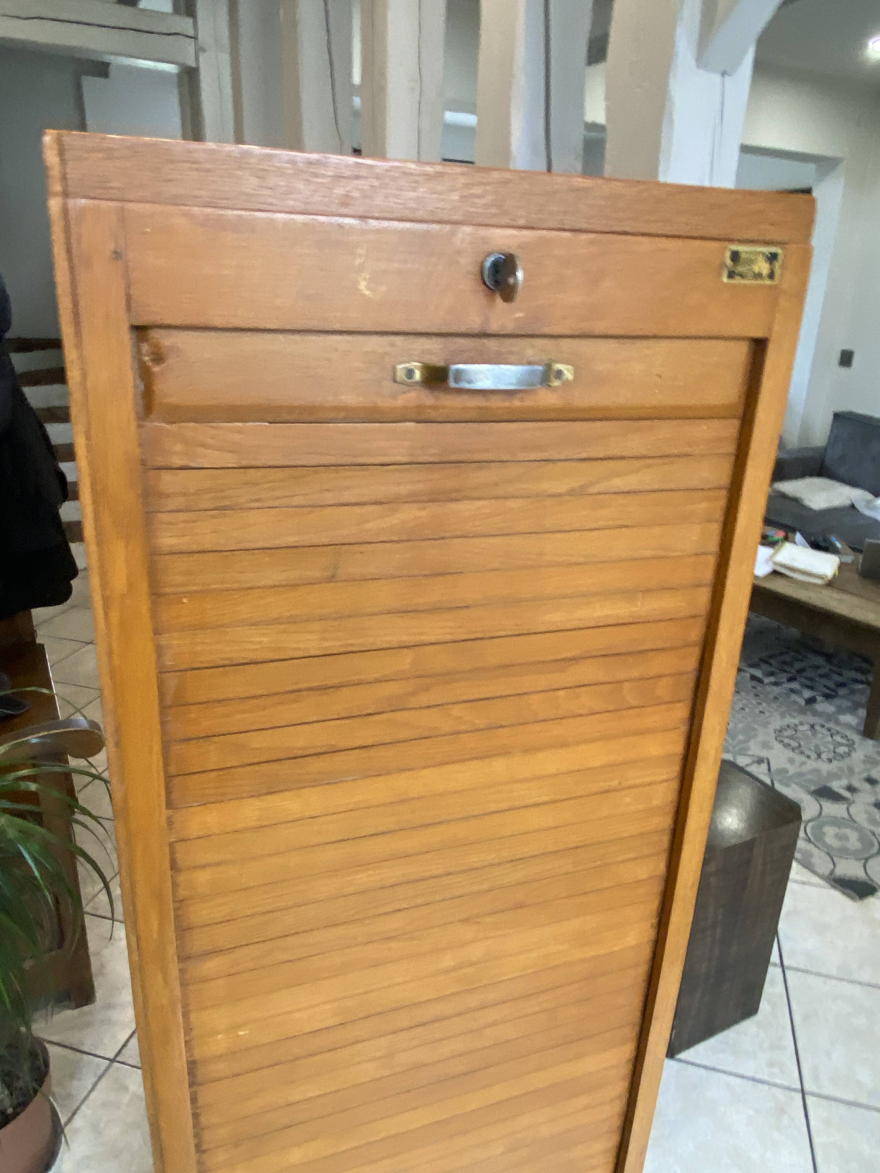 1950s oak office storage cabinet with curtains.
