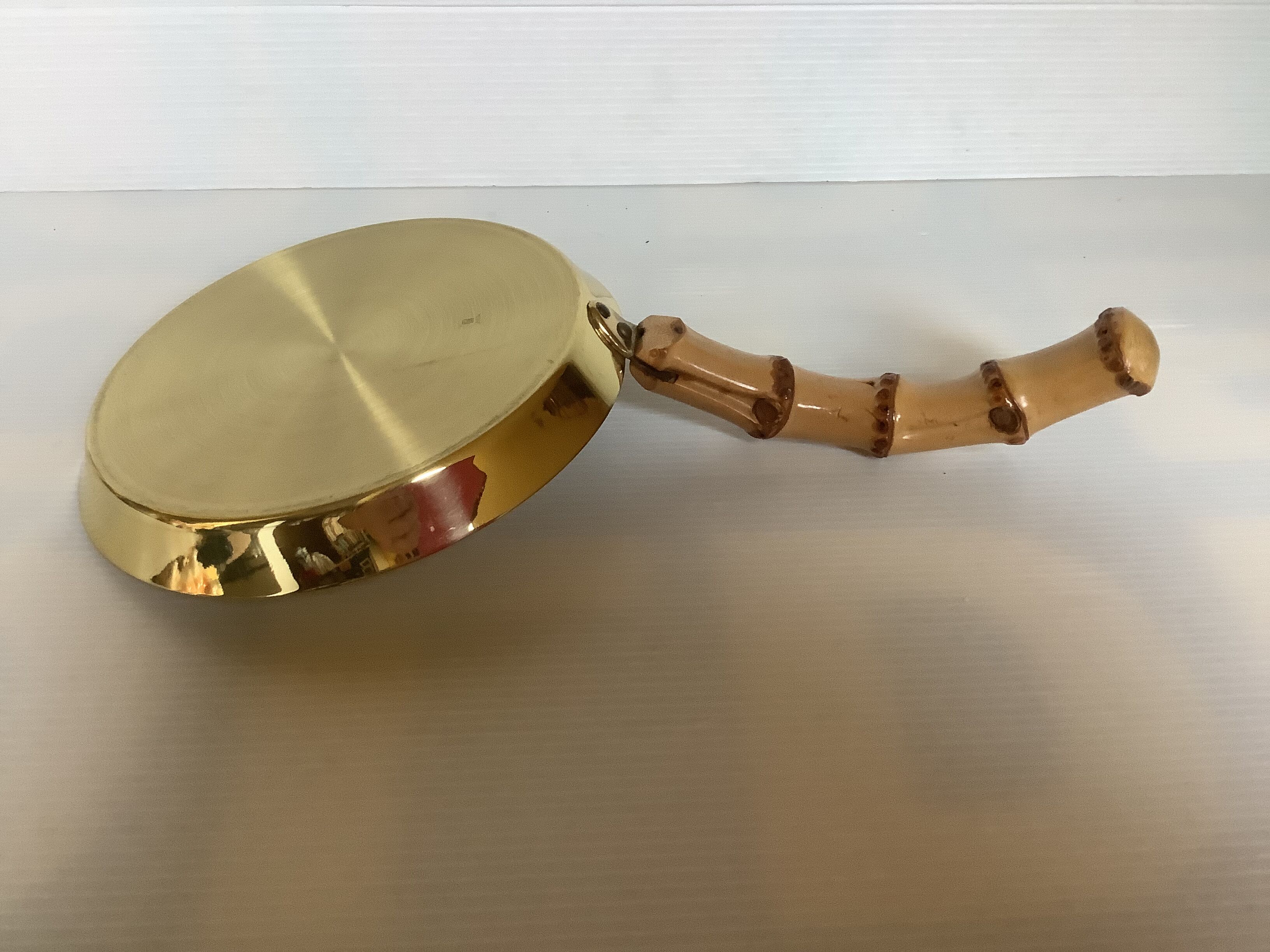 Grasoli Germany bamboo brass pocket emptier