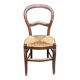 Vintage solid oak chair with rush seat, Louis Philippe style from the 20th century.