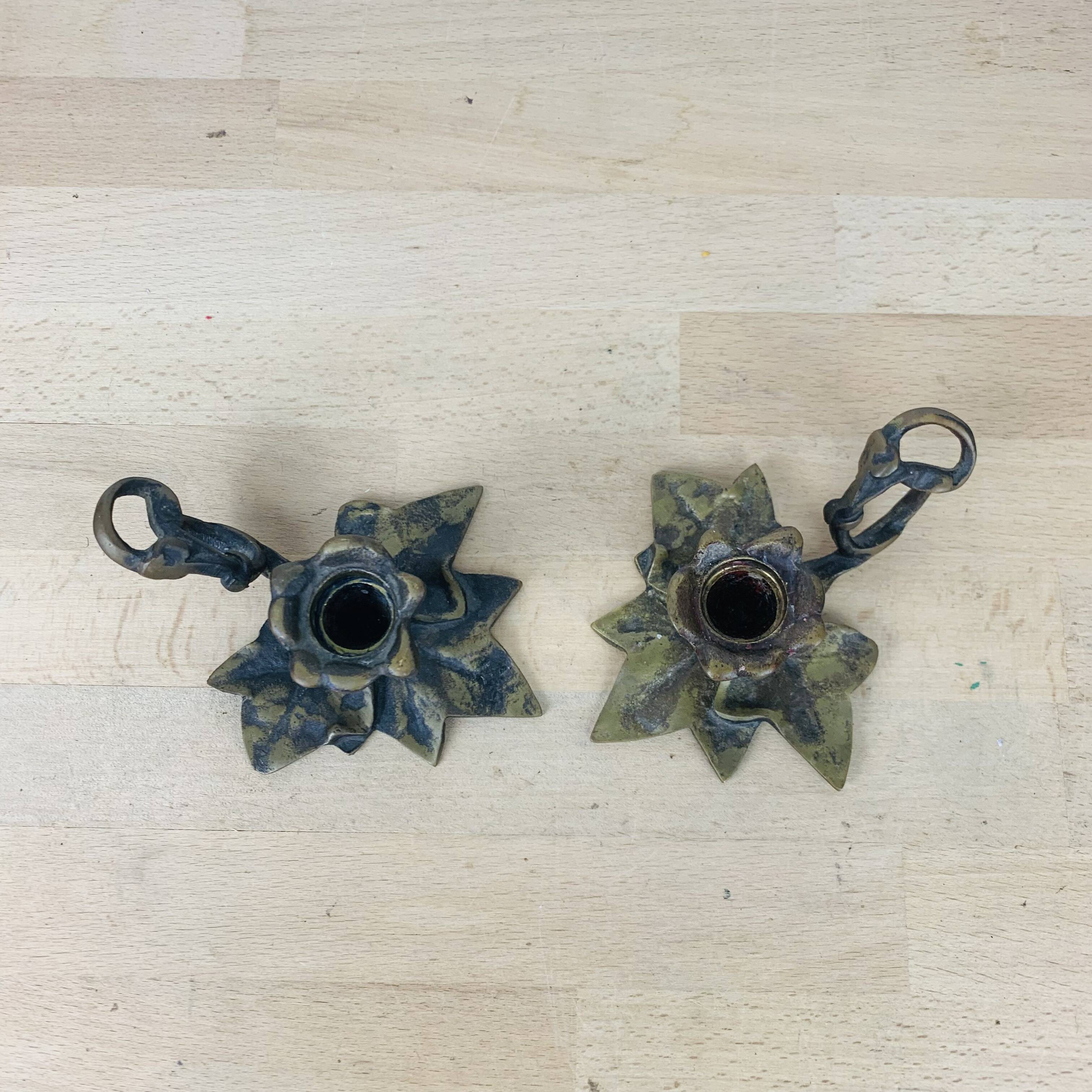Pair of brass flower candlesticks, cellar