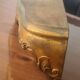 Shelf in wood and gold paint