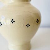 Vintage butter yellow ceramic pitcher in rustic style