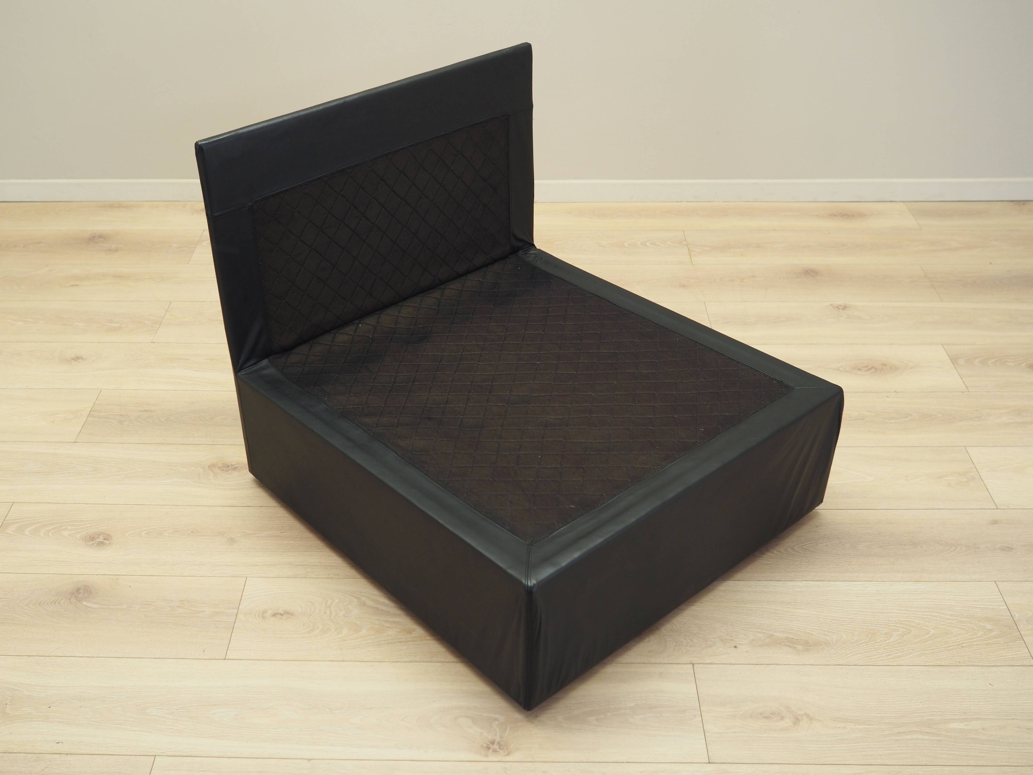 Black leather pouffe/armchair, Italian design, 1960s, production: Italy