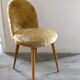Golden moumoute chair, wooden compass feet, 60s