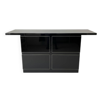 Black lacquered 4-drawer cabinet by David Lange with a lacquered top.