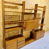 Modular wall-mounted bookcase in walnut