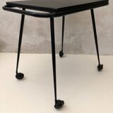 Black table on wheels from the 60s