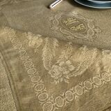 Old linen tablecloth and evening tinted in vermeil