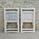 Pair of folding wooden chairs, white patina, circa 1960.