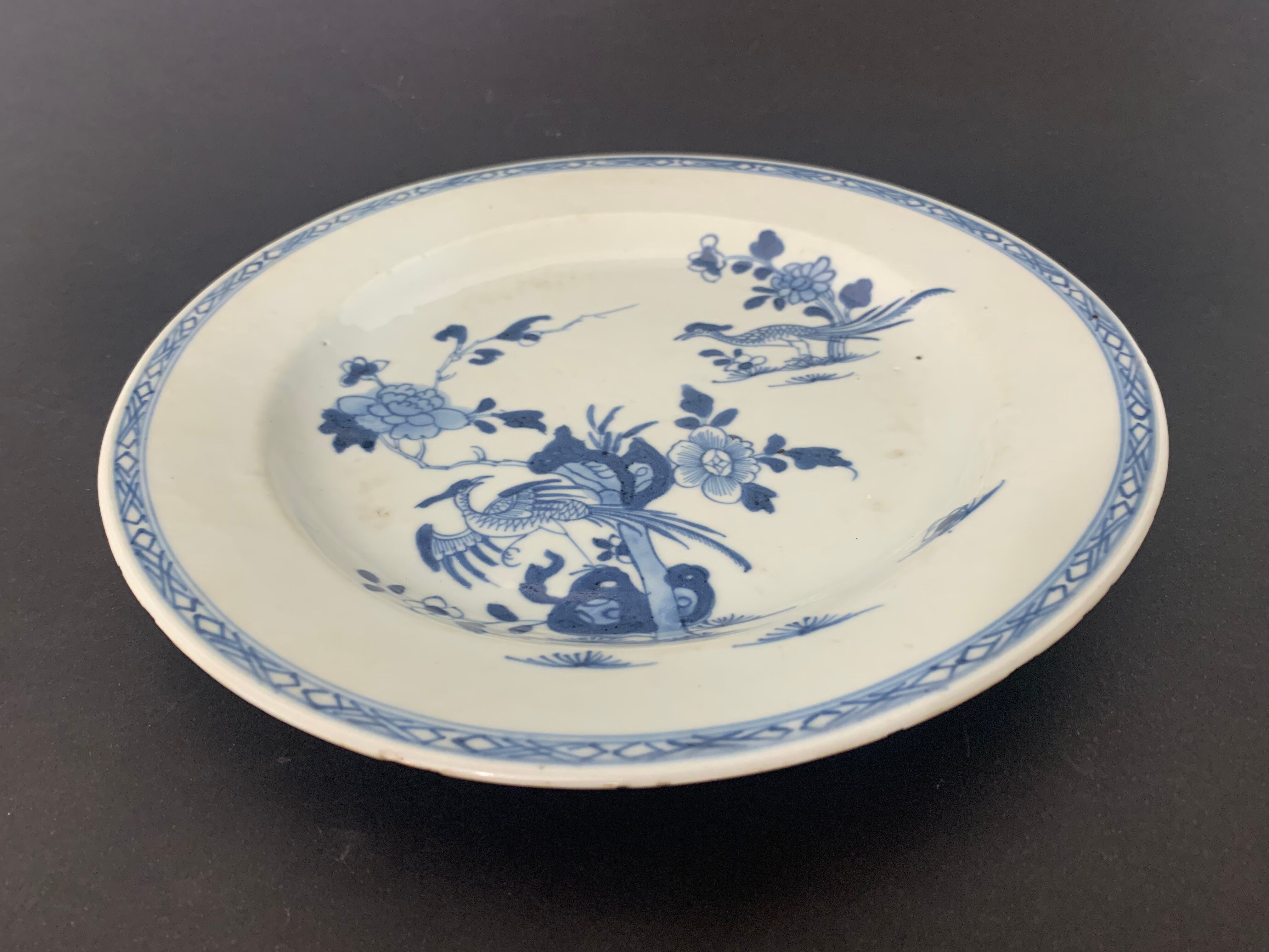 Blue and white porcelain plate of the blue family, 19th century