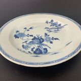 Blue and white porcelain plate of the blue family, 19th century