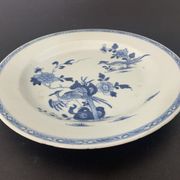 Blue and white porcelain plate of the blue family, 19th century