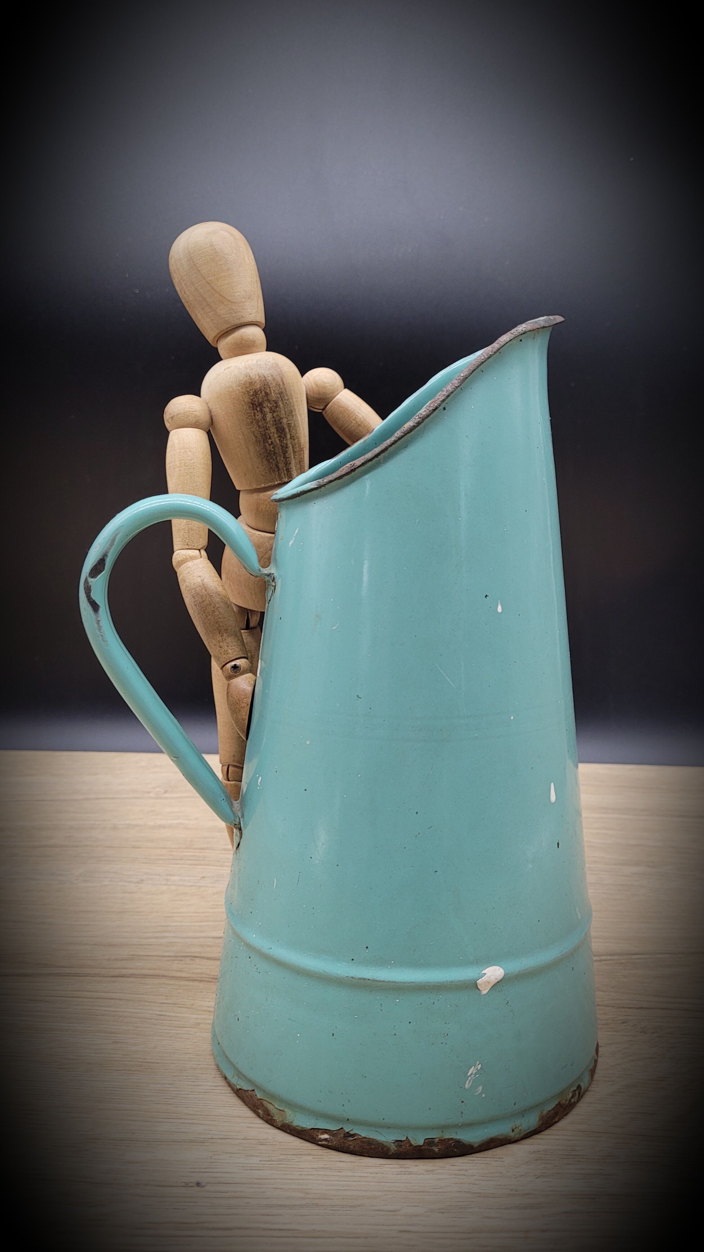 Green enamelled pitcher