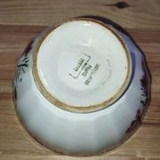 Bowls Faïencerie de Sarreguemines with rose decoration (the two red ones)