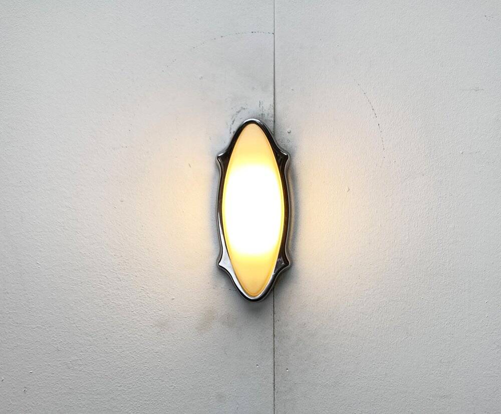 Postmodern Italian wall lamp for indoor and outdoor use, Geco 1 by Luciano Pagani and Angelo Perversi for Arteluce, 1990s.