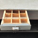 Old counter with gray patina, zinc top and a drawer
