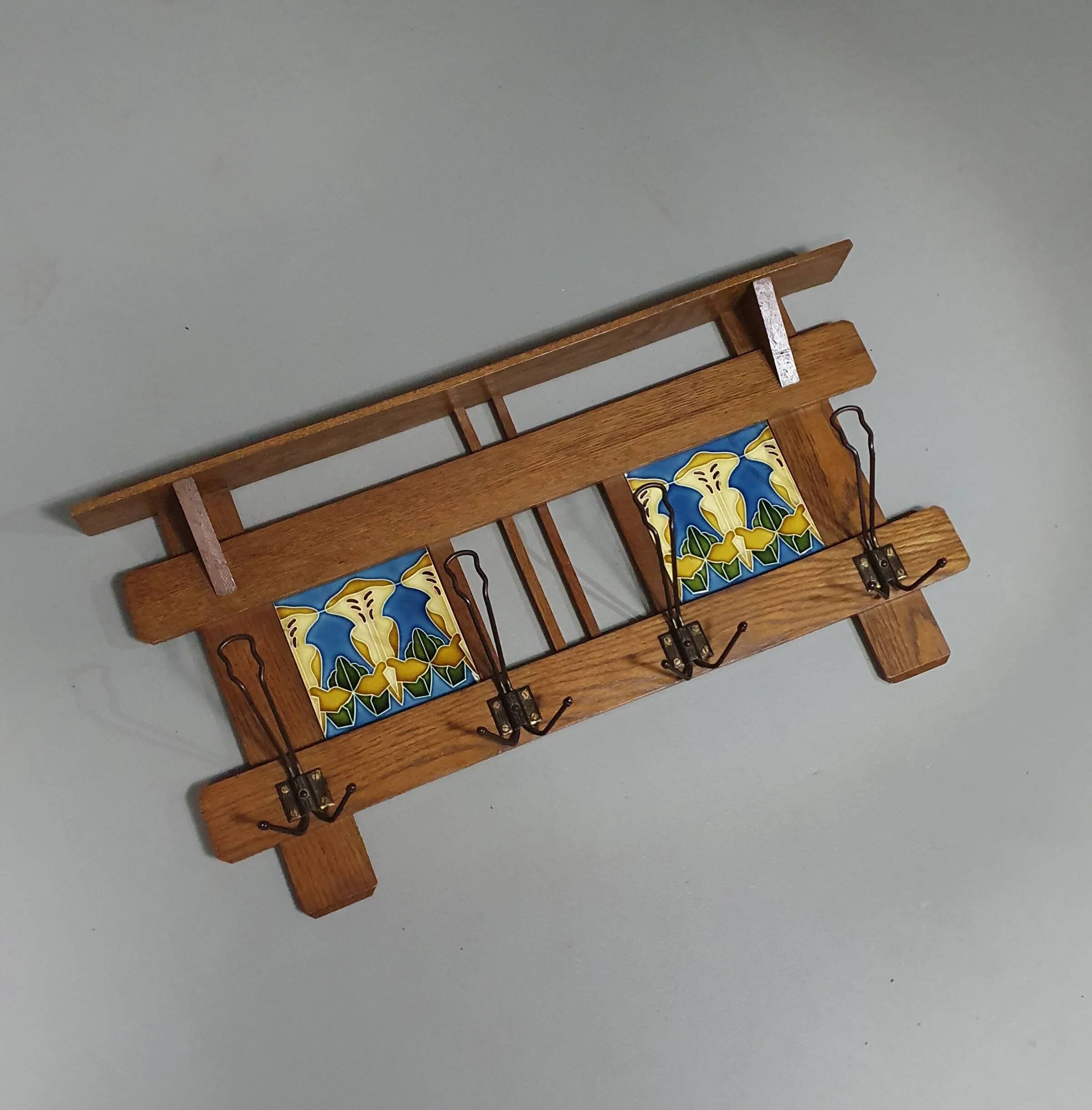 Art Nouveau wall coat rack with tiles