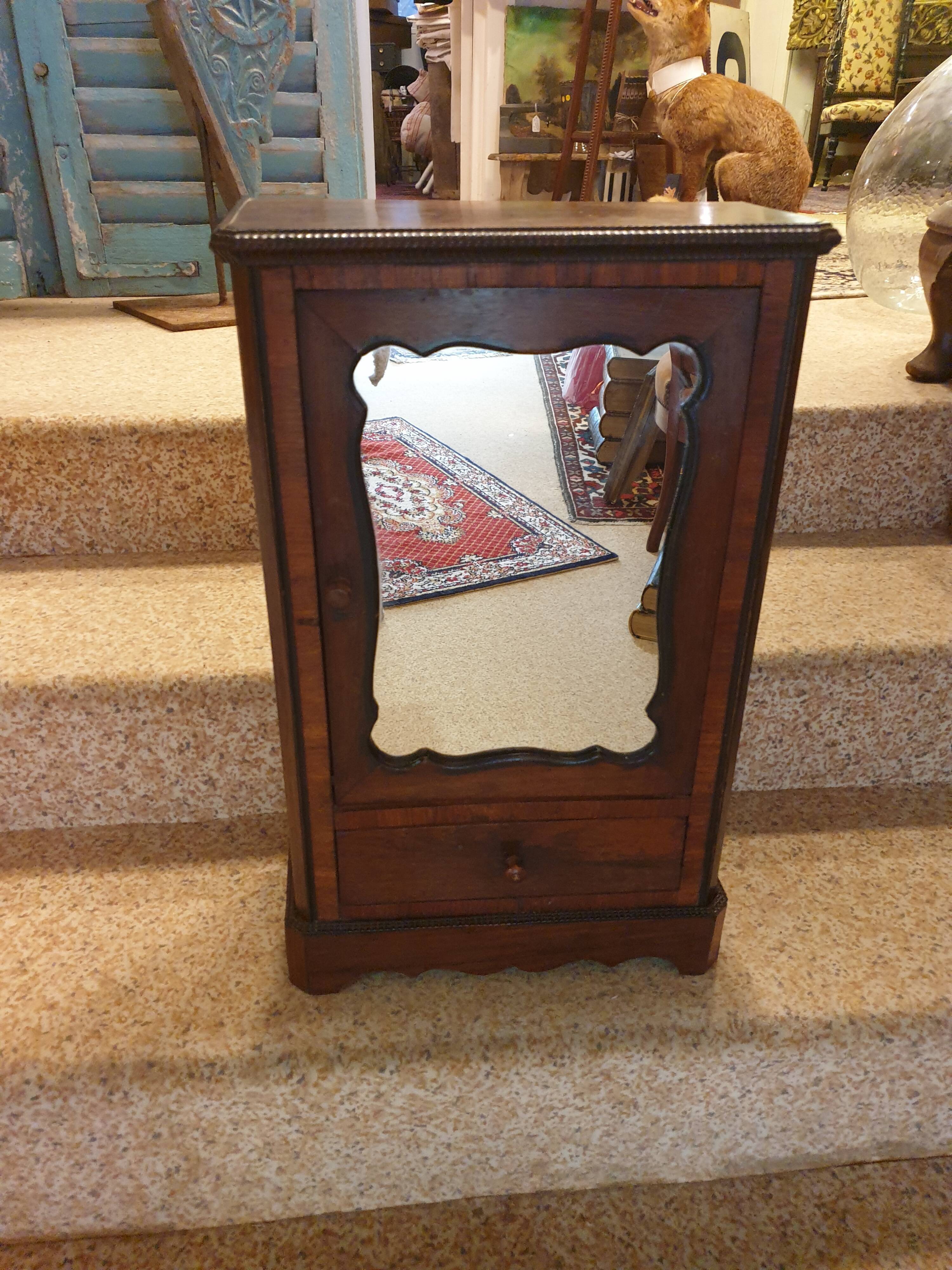 Antique doll cabinet
