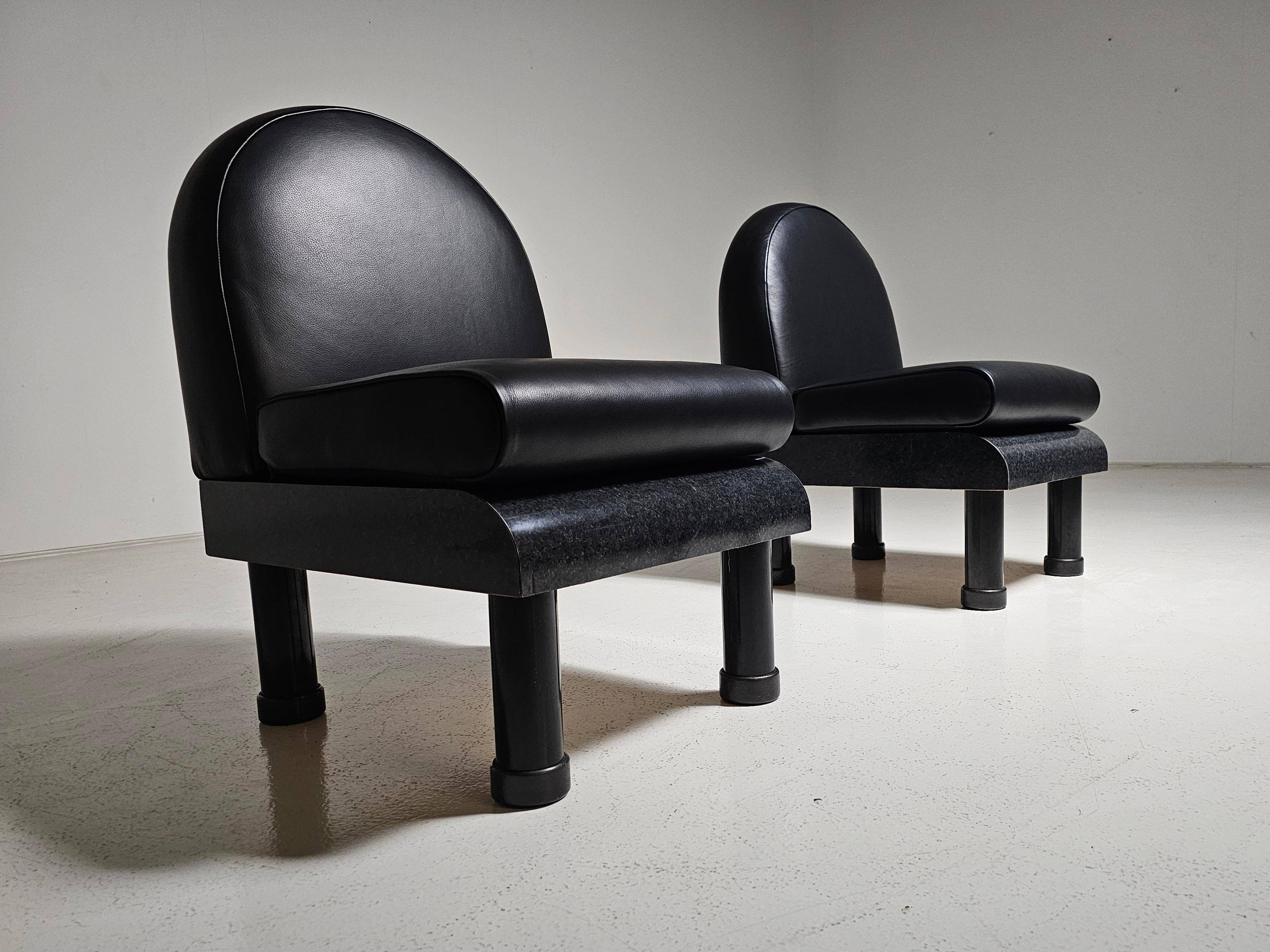 Black leather loungers , 1980.