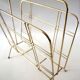 Gold metal magazine rack