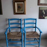 Pair of Provençal armchairs in painted wood and straw, around 1960.