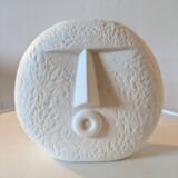 Stylized face biscuit vase
