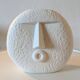 Stylized face biscuit vase