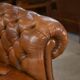 Tan leather tufted Chesterfield sofa