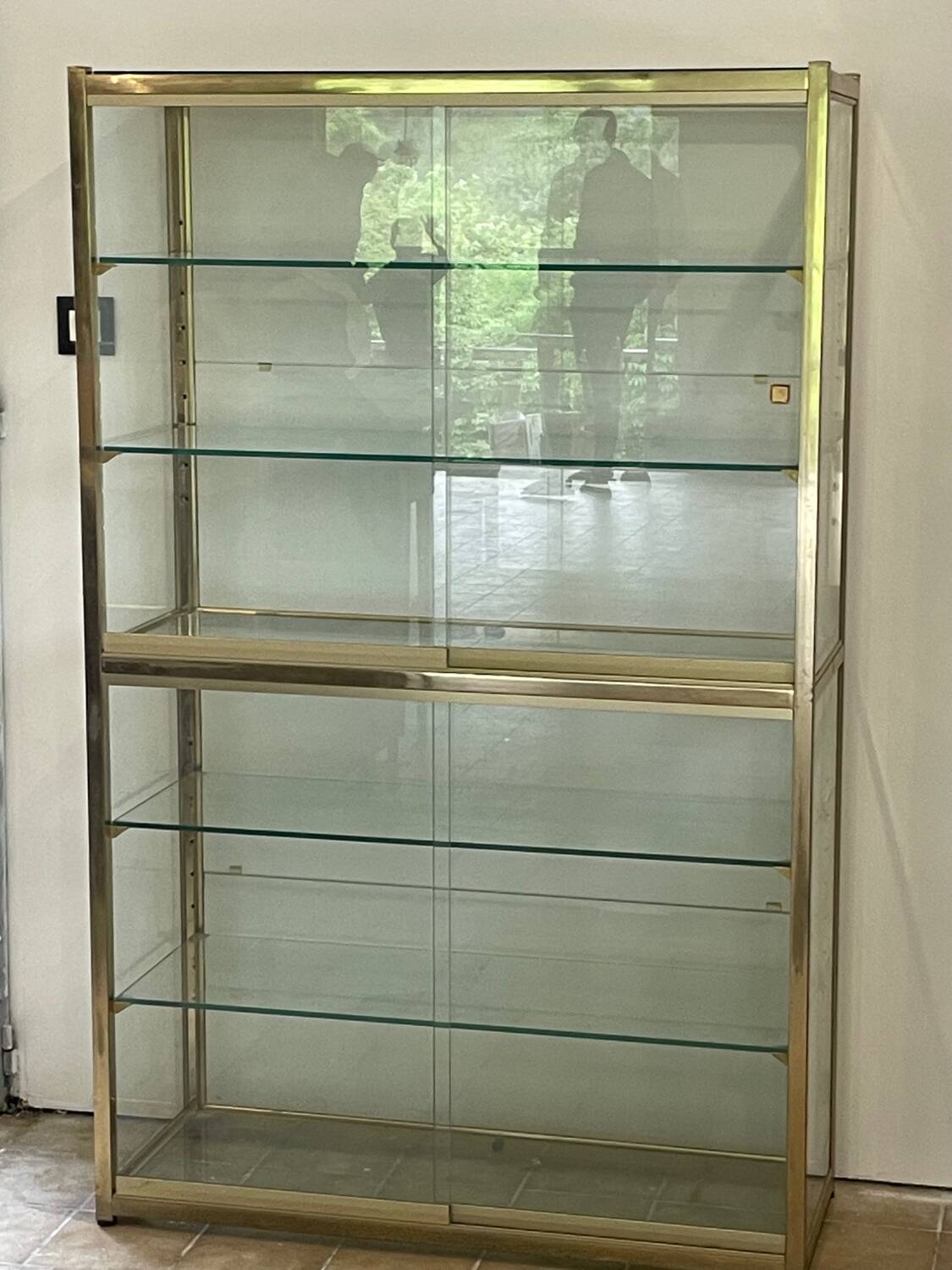 Large exhibition window in gilded brass 20th century period