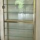 Large exhibition window in gilded brass 20th century period