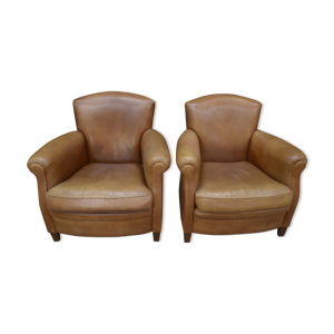 Paire de fauteuils club en cuir