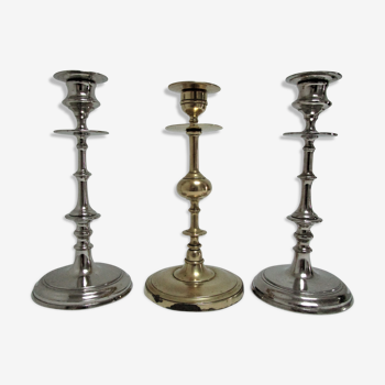 three brass and chrome candle holders early twentieth century