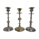 three brass and chrome candle holders early twentieth century