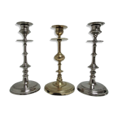 three brass and chrome candle holders early twentieth century