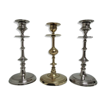 three brass and chrome candle holders early twentieth century