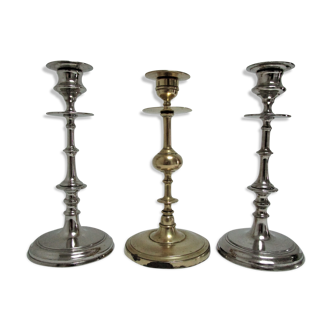 three brass and chrome candle holders early twentieth century